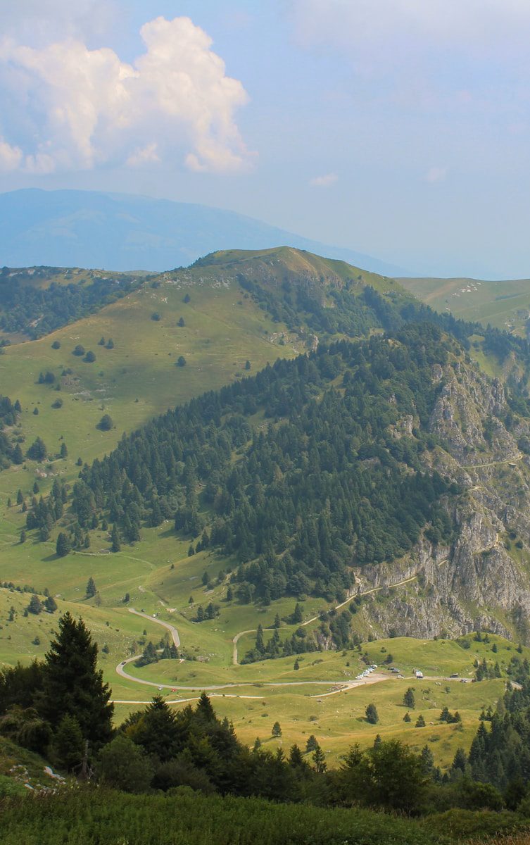 green and brown mountains under blue sky during daytime